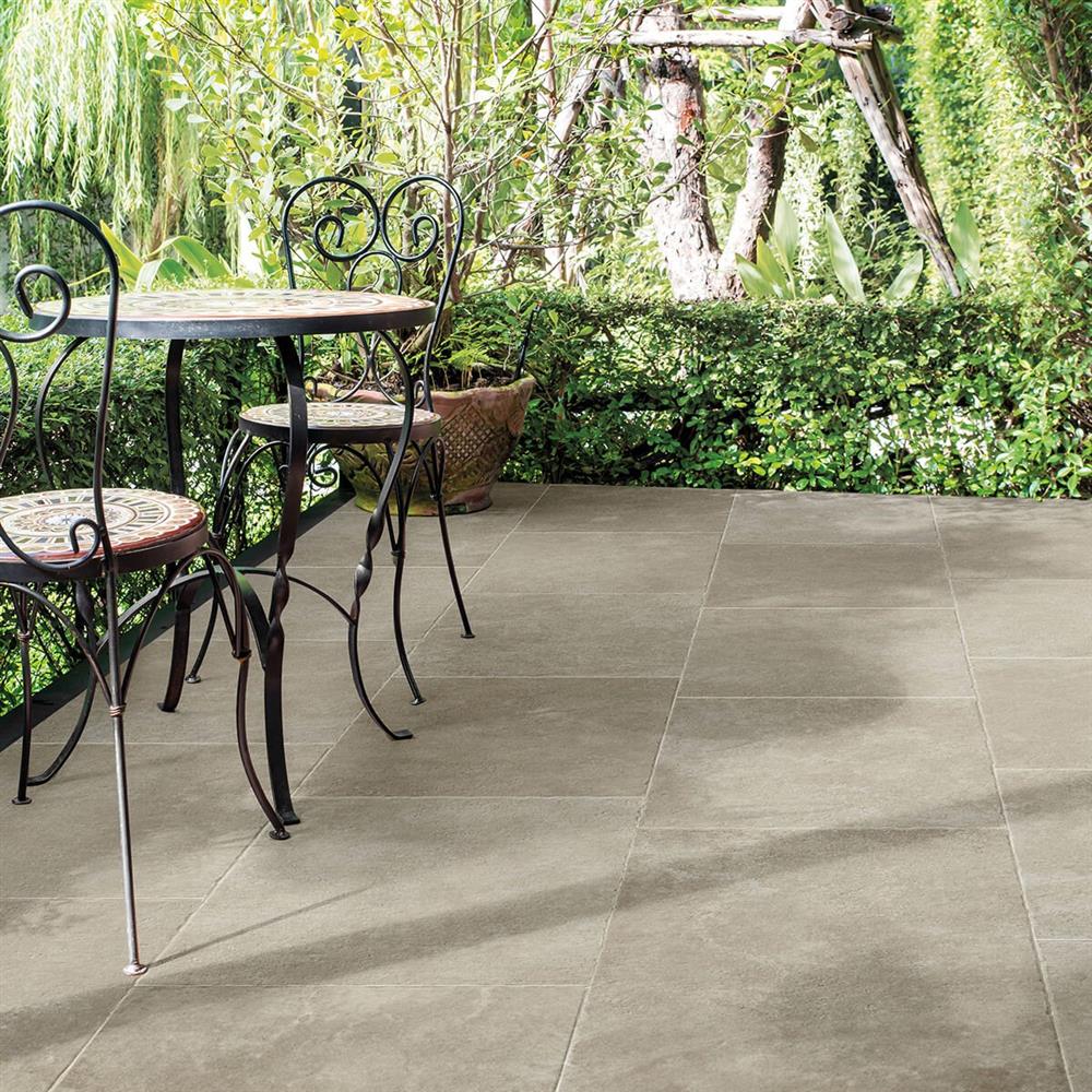 Green drenching gardening trend with antiqued porcelain patio